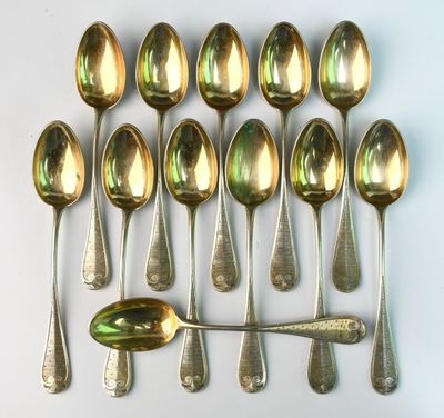a lot of spoons and spoon spoons on the table