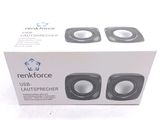 packaging of a pair of speakers sitting on top of a white table