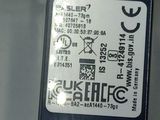 a close up of a metal object with a label on it