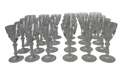 a lot of wine glasses that are sitting on the table