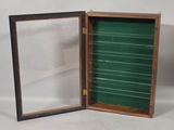 pair of antique wooden display cases with glass doors