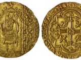 une pièce d'or portant l'image d'un homme et d'une femme