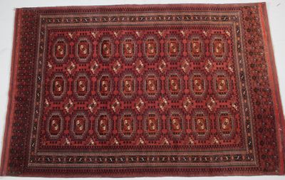 a close up of a rug on a table with a white background