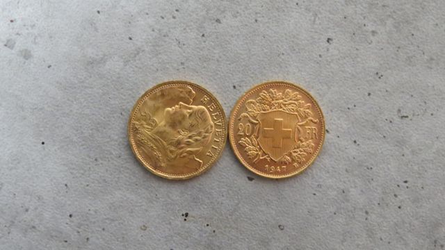 Deux pièces de monnaies en or à valeur faciale de 20 francs Suiss...