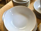 a table with a lot of plates and bowls on it