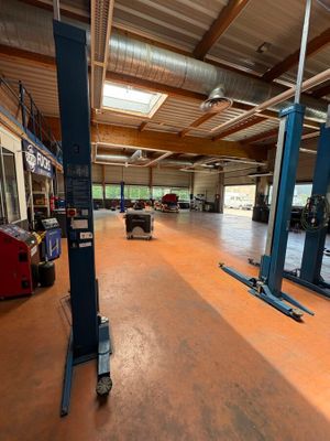 a large garage with a lot of equipment in it