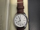 a watch that is sitting in a box on the table
