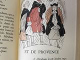 an open book with a picture of people walking in the rain