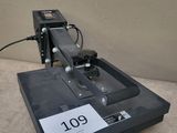 a close up of a machine that is sitting on a table