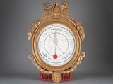 a clock that is sitting on a stand with a clock on it