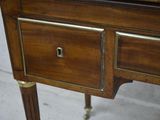 a close up of a desk with a drawer on it