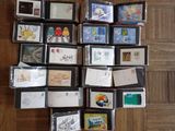 many cards and envelopes laid out on the floor
