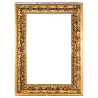 un cadre doré orné d'un motif décoratif sur fond blanc