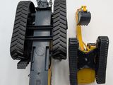 a yellow and black toy tractor and a black and yellow toy tractor
