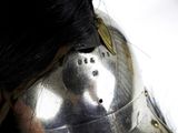 a close up of a helmet on a woman ' s head