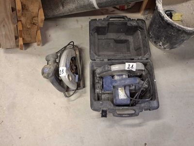 a tool box with tools in it on the floor