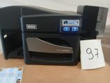 a printer that is sitting on a table with a price tag on it