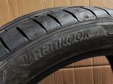 tire tread of a car on a cardboard box next to a cardboard box