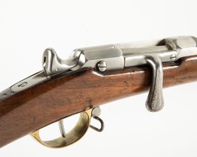 a close up of a rifle on a white background with a white background