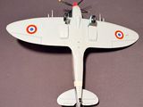underside view of a model of a single engine plane on a table