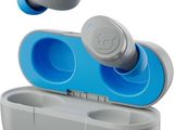 a close up of a pair of ear buds in a case