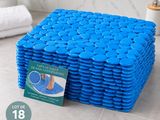 a stack of blue pebbles sitting on top of a tiled floor