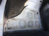 a close up view of the inside of a vehicle ' s floor