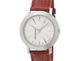 un gros plan d'une montre sur fond blanc, avec un bracelet rouge