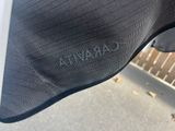 the back of a black jacket with the word saranita written on it