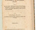un livre ouvert dont la couverture représente un oiseau