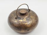 an antique chinese teapot on a white background with chinese writing