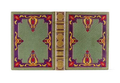 a green book with gold trim and a red and yellow cover