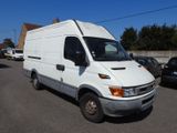 a white van that is parked in a parking lot