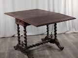 an image of a table with a wooden top sitting on top of a hard wood floor