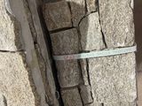 several pieces of stone stacked on top of each other in a pile