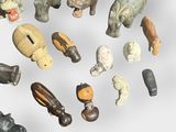 many different types of animal figurines on a white surface