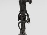 an image of a statue of a woman holding an umbrella over her head