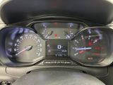 a close up of a car dashboard with a speedometer and gauges