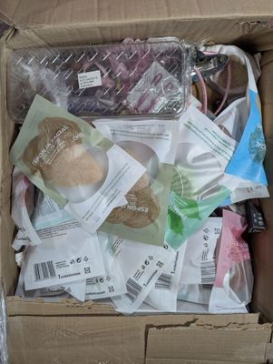 a box full of food that is sitting on the floor