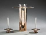 two vases and a candle holder on a table
