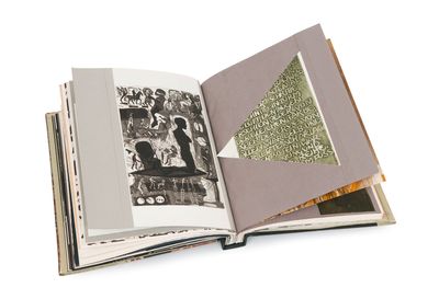 an open book with a picture of a man and a woman on it