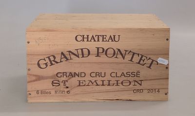 a wooden box with a label on it that says chateau grand pontiff
