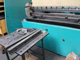 an image of a machine that is working on a piece of paper