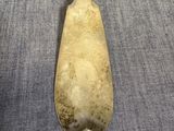 a spoon that is sitting on top of a table