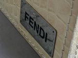a box with a sign on it that says fendi