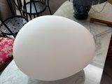 a lamp that is sitting on a table in a living room