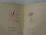 an open book with a drawing of a woman sitting on a bench