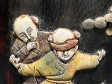 a close up of a statue of a man and a dog