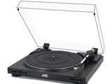a close up of a record player on a white surface