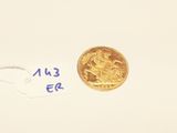 an image of a gold coin on a white surface